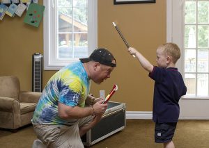 Coach Steve Playing with Kids with Wand